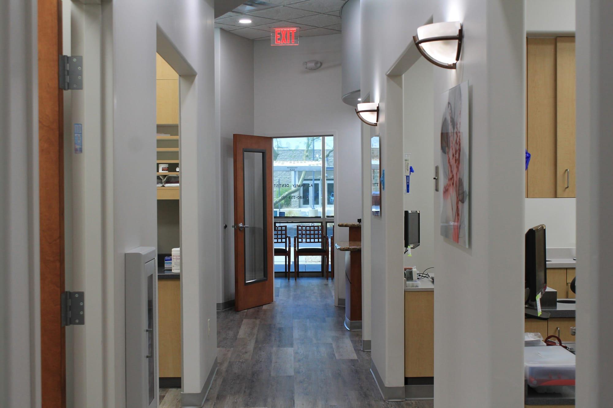 Bright hallway leading to the treatment rooms at our Chandler office